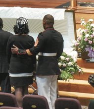 Family members pay their last respects to Alicia Rasin before her funeral service last Saturday at Saint Paul’s Baptist Church.