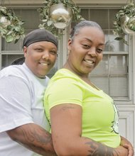 Shamika, left, and Kristea Fauntleroy affectionately embrace last week outside their Tappahannock home one year after Virginia legalized same-sex marriage, allowing the couple to exchange vows.