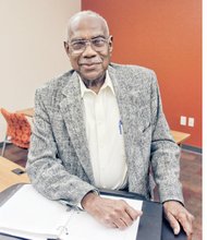 Willard Bailey prepares to teach a health class for students at the Lynchburg-based Central International College he now heads. Location: Northside Family Learning Center, a Richmond satellite location for the college. 