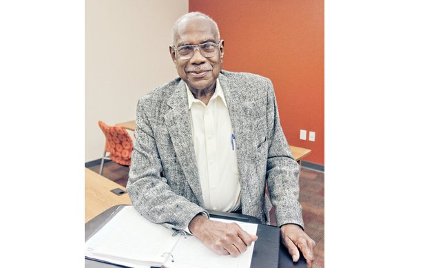 Willard Bailey prepares to teach a health class for students at the Lynchburg-based Central International College he now heads. Location: Northside Family Learning Center, a Richmond satellite location for the college. 