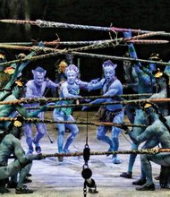 
Colorfully costumed artists, center from left, Guillaume Paquin (Entu), Giulia Piolanti (Tsyal) and Gabriel Christo (Ralu) go through final rehearsals last week in Shreveport, La., for “TORUK – The Final Flight,” the latest Cirque du Soleil production. The show, inspired by the award-winning movie “AVATAR,” will run the Friday, Nov. 27, through Sunday, Nov. 29 at Richmond Coliseum. 