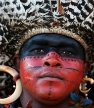 A Pataxo Indian, of Brazil, attends the World Indigenous Games in Palmas, Brazil, Thursday, Oct. 29, 2015.