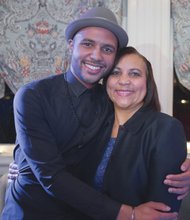 Richmonder Rayvon Owen, a top finalist on “American Idol,” hugs his mother, Patrice Fitzgerald, during a cocktail reception last Friday sponsored by the Friends of the Center for the Arts at Henrico High School. The party kicked off the center’s 25th anniversary celebration weekend. Rayvon, the center’s most noted graduate, served as an honorary co-chair of the weekend’s events, which included performances by the singer and his band and a meet-and-greet with ticket holders.