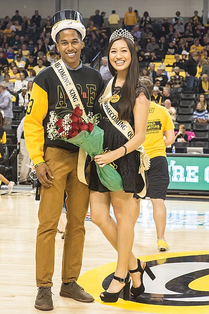 VCU homecoming royalty //
Lawrence Cooper and Amy Chong are all smiles after they were presented as the Virginia Commonwealth University 2015 Homecoming King and Queen last Friday at the Rams’ game against Prairie View A&M University at the Siegel Center. The Rams trounced the Panthers 75-50. Last weekend’s homecoming festivities at VCU included a parade, alumni and student leader networking brunch, a step show and a VCU women’s basketball game won by the Lady Rams, 73-42, over Coppin State University.