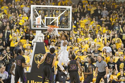 Virginia Commonwealth University forward Justin Tillman takes it to the hoop to score in the game last Friday against Prairie View A&M University at the Siegel Center. The Rams won 75-50.