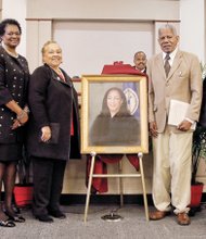 Judge Jamison retiring //
Family and friends join in unveiling the portrait of outgoing Judge Birdie Hairston Jamison, right, that will hang in the Richmond General District Court. With her at Friday’s ceremony at the Manchester Courthouse are, from left: Sheriff C.T. Woody Jr., Judge Jamison’s sister, Paige Hairston, Delegate Delores L. McQuinn, former Delegate Jean W. Cunningham, Richmond General District Court Chief Judge D. Eugene Cheek, former state Sen. Henry L. Marsh III and Judge Jamison’s other sister, Mable Lewis. Judge Jamison, 57, is the dean of the state’s traffic court judges. She began hearing cases in Richmond in 1991. Her tenure on the court officially ends Tuesday, Nov. 30. She must step down because the General Assembly declined to reappoint her to a new term last January. Numerous speakers at the retirement ceremony lauded her service to the court.