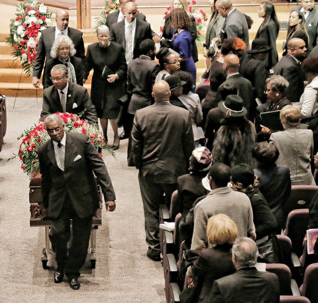 Remembering Leonard Lambert Sr. //
Hundreds of people gathered to remember Leonard W. Lambert Sr. at a funeral service Tuesday at Saint Paul’s Baptist Church in Henrico County.
Stirring music filled the sanctuary and family and friends shared warm reflections of Mr. Lambert, who was described as a man of strong faith who left a lasting mark in Metro Richmond by his decades of legal, church and community service.
Dr. John W. Kinney, dean of the Samuel DeWitt Proctor School of Theology at Virginia Union University, delivered the eulogy at the service, which also included remarks from Mr. Lambert’s sister, Dr. Elizabeth Johns, Mayor Dwight C. Jones and others.
Among his achievements, Mr. Lambert became Richmond’s first African-American judge in 1973 when he was named a substitute judge for the Richmond General District Court.
At left, his wife, Sylvia J. Lambert, and other family members leave their pews during the recessional at the conclusion of the service.