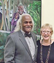 The Rev. Robert W. Oliver with artist Judy Holloway.