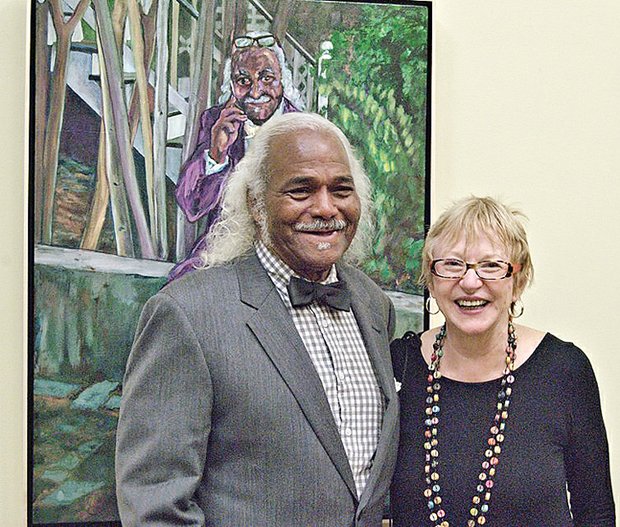 The Rev. Robert W. Oliver with artist Judy Holloway.