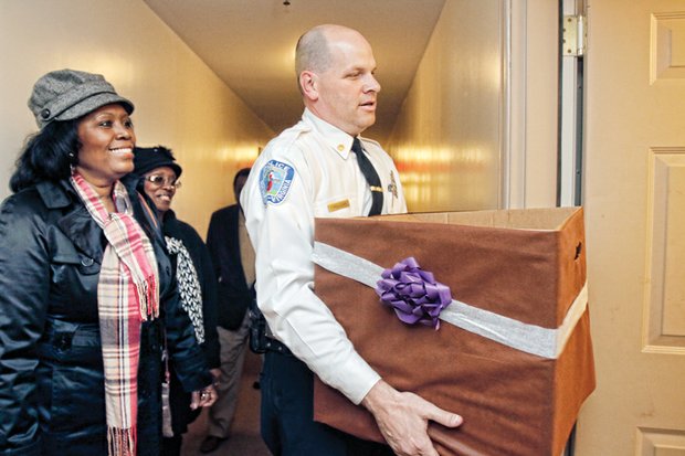 In Alicia Rasin’s memory //
Delivering turkeys and other Thanksgiving fixings, warm hugs and big smiles, Mayor Dwight C. Jones, Richmond Police Chief Alfred Durham, Sheriff C.T. Woody Jr., police officers, area ministers and community leaders this week carried on the holiday tradition of giving to families started by the late Alicia Rasin, the city’s “Ambassador of Compassion.” Ms. Rasin, who helped families of homicide victims and others, succumbed to heart failure in early October. 