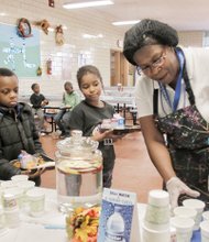 Water is good for you. That’s the healthy message Richmond Public Schools and Richmond City Health District officials passed to elementary school students during Water Week demonstrations and activities last week. The aim is to encourage students to drink more water rather than sugar-laden drinks. Above, Bridgette Harris distributes fruit-infused water to students at George Mason Elementary School in Church Hill last Friday. Water Week kicked off the RPS Hydration Station Initiative involving special water fountains that have been installed in all city elementary schools. Students will receive water bottles they can refill at the hydration stations.