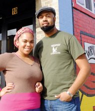 
Kirsa and Sean Crippen stand outside the Streetcar Café Saturday as they prepare to close up their coffee shop for good. Location: 10 E. Brookland Park Blvd. in North Side.