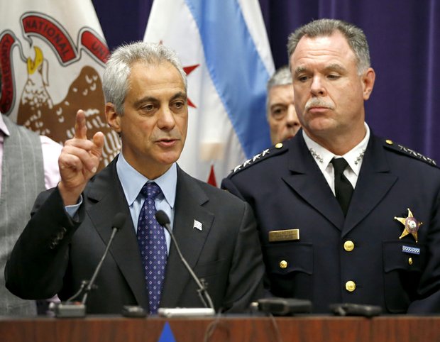 Chicago Mayor Rahm Emanuel, left, and Police Superintendent Garry McCarthy appear at a news conference Nov. 24 to announce the first degree murder charge against police officer Jason Van Dyke in the 2014 shooting death of Laquan McDonald, 17. Mayor Emanuel on Tuesday asked Mr. McCarthy to resign. 