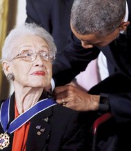 Honoring a pioneer // President Obama presents the Presidential Medal of Freedom to Katherine G. Johnson of Newport News on Nov. 24 during an event in the East Room of the White House. The 97-year-old was one of the few women and African-Americans who worked for NASA when she started as a pool mathematician at the space agency’s Langley Research Center in Hampton in 1953. Her mathematic computations have influenced every major space program from America’s first manned space flight in 1961 to today’s Space Shuttle program. Mrs. Johnson was one of 17 individuals honored last week by President Obama, some posthumously, with the nation’s highest civilian award.