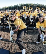 The Highland Springs Marching Battalion swings into action at the ceremony celebrating the state’s No. 1 football team. The band played Tuesday as the champions paraded from the school to Kreiter Stadium and the cheers of jubilant students and fans.