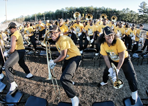 The Highland Springs Marching Battalion swings into action at the ceremony celebrating the state’s No. 1 football team. The band played Tuesday as the champions paraded from the school to Kreiter Stadium and the cheers of jubilant students and fans.