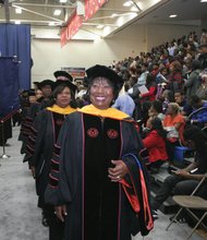 Dr. Pamela V. Hammond, interim president of Virginia State University, leads
the academic procession into the fall commencement ceremony last Saturday at
Daniel Gymnasium on the campus. State Sen. Rosalyn R. Dance of Petersburg, the commencement speaker, is second in the line that includes members of the VSU Board of Visitors, administrators and faculty. Sen. Dance and Dr. Hammond received honorary degrees during the ceremony. 