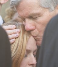 Former Gov. Bob McDonnell embraces his daughter, Cailin, after a federal court judge sentenced him in January to two years in prison for corruption.