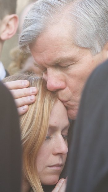 Former Gov. Bob McDonnell embraces his daughter, Cailin, after a federal court judge sentenced him in January to two years in prison for corruption.