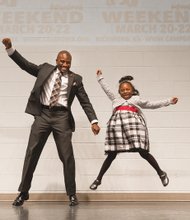 Michael Walker and his 6-year-old daughter, Sage, perform with exuberance in March at the eighth annual Date with Dad, Dinner and Dance at Trinity Family Life Center on North Side.
