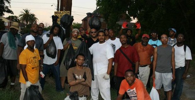 Zin leading NBUF-Houston (National Black United Front) and other volunteers in cleaning the 3rd Ward community
