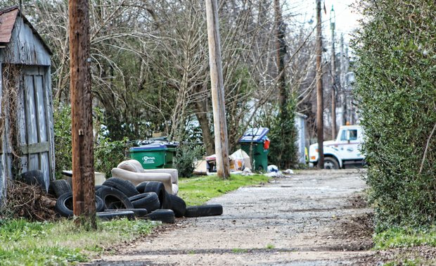 City becomes dumping ground again // “No city policies changed, and the dumping and accumulated bulk trash is rapidly taking place,” she continued in pointing to these examples of what she considers a “disturbing reality.”
The problem, Ms. Robertson stated, is that the city is doing too little to prevent people from driving along alleys and dumping “mattresses, old furniture and tires free of charge.” 
Unless residents get vehicle license plates or photos of violators, “for law-abiding citizens living in such communities — tough luck.” 
However, Ms. Robertson stated she is not giving up trying to find ways to hold accountable those who illegally dump refuse. 
She is promising to develop a strategy and to share it with residents. She urges residents with ideas to email them to Ellen.Robertson@Richmondgov.com. — JEREMY M. LAZARUS