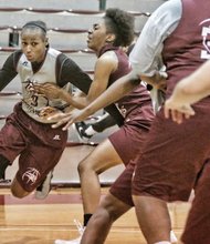 Virginia Union University’s Kiana Johnson drives to the basket during a recent practice with the Lady Panthers.