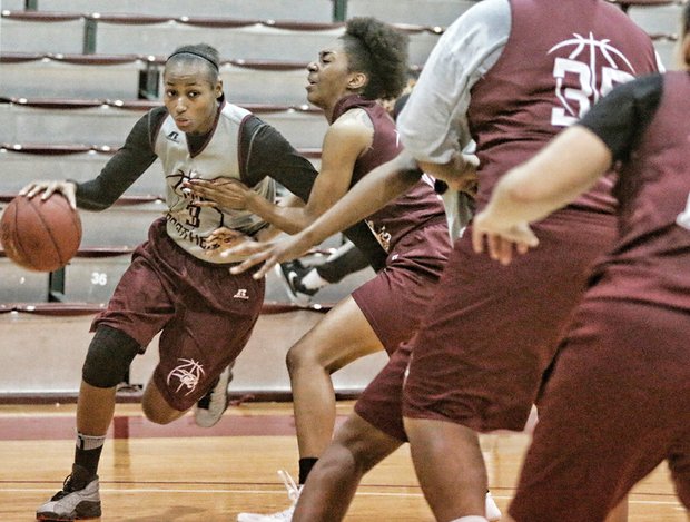 Virginia Union University’s Kiana Johnson drives to the basket during a recent practice with the Lady Panthers.