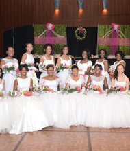 Delightful debutantes //
Thirteen young women were presented by the Upsilon Omega Chapter of Alpha Kappa Alpha Sorority at its 2015 Debutante Ball. The formal evening of recognition was held Saturday, Dec. 19, at the Greater Richmond Convention Center in Downtown. The theme of the elegant affair was “A Holiday Wrapped in Magic.” The ball was the culmination of months of activities the high school students participated in hosted by the AKAs, a service organization composed of college-educated women.