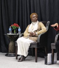 Mayor Toni Harp, right, of New Haven, Conn., speaks at a panel discussion Tuesday as Mayor Tyus Byrd, left, of Parma, Mo., and former Miami Gardens, Fla., Mayor Shirley Gibson listen at Summit Construction & Environmental Services on South Side.