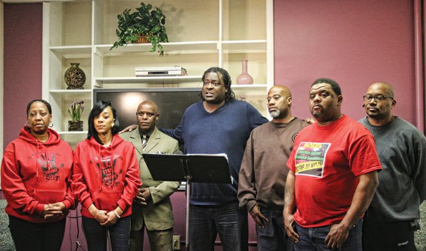 

Organizer James E. “J.J.” Minor III, center, speaks at Tuesday’s news conference announcing the Community Action Summit. Other summit sponsors with him are, from left, Kim Morgan and LaToya Williams of Mothers Against Violence; Charles Willis of United Communities Against Crime; and Woody Winborne, Maurice Tyler and Aaron Turner of Coaches Against Violence Everywhere.