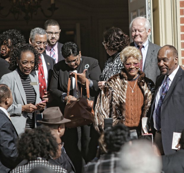 Let Freedom Ring //  Church member Liz Montgomery, left, of Williamsburg, Congressman Robert C. “Bobby” Scott and entertainer Dionne Warwick, right, leave the church after the ceremony.
People interested in ringing the bell during February can register online at www.letfreedomringchallenge.org.