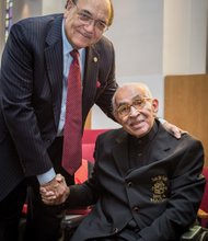 
Virginia Union University President Claude Perkins, left, honors Dr. Wyatt T. Walker during a worship service Thursday morning at the campus.