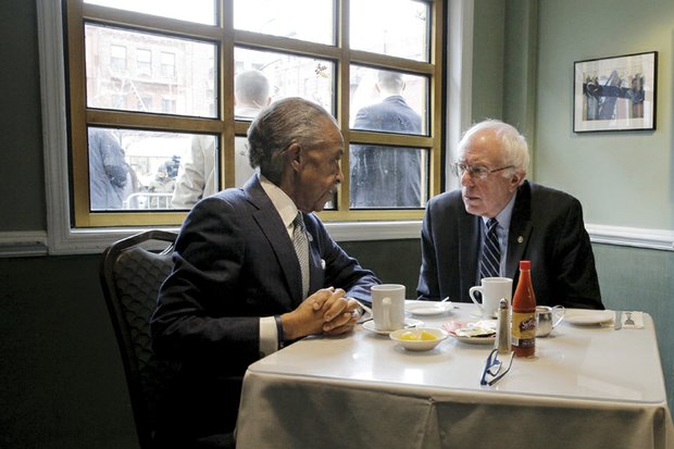 U.S. Sen. bernie Sanders, fresh off his Democratic presidential primary win in New Hampshire, meets with the Rev. Al Sharpton at a Harlem restaurant Wednesday morning.