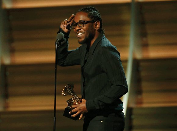 Hip-hop ruled the stage Monday night at the Grammy Awards in performances that put racial tension back in the national ...