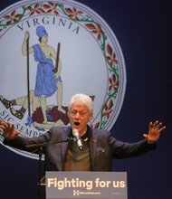 ￼Former President Bill Clinton fires up the audience Wednesday night at the Hippodrome Theater in Richmond’s Jackson Ward during a campaign appearance for his wife, Democratic presidential candidate Hillary Clinton.