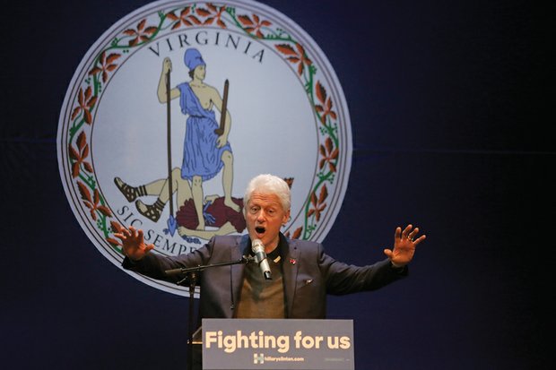 ￼Former President Bill Clinton fires up the audience Wednesday night at the Hippodrome Theater in Richmond’s Jackson Ward during a campaign appearance for his wife, Democratic presidential candidate Hillary Clinton.