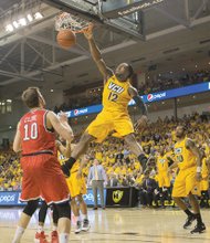
Virginia Commonwealth University forward Mo Alie-Cox emphatically slams home two of his 12 points in the Rams’ 87-74 win last Friday over the University of Richmond Spiders at the Siegel Center. 