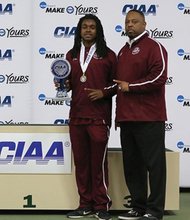 Courtesy of Virginia Union University
Virginia Union University track star Chazton McKenzie, left, pictured with Panthers Assistant Coach Tom Gosier, won the MVP award at the CIAA Indoor Track and Field Championships after winning the heptathlon and long jump and placing in six other events.