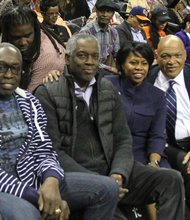 CIAA FUN // Several luminaries were in the arena, below left, including former CIAA and NBA basketball greats Earl “The Pearl” Monroe of Winston-Salem State University and Richmond native Bobby Dandridge of Norfolk State University with CIAA Commissioner Jacquie McWilliams. 