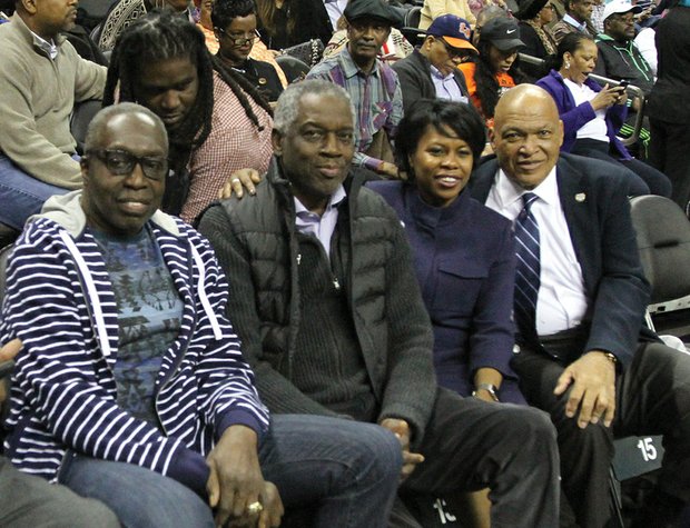 CIAA FUN // Several luminaries were in the arena, below left, including former CIAA and NBA basketball greats Earl “The Pearl” Monroe of Winston-Salem State University and Richmond native Bobby Dandridge of Norfolk State University with CIAA Commissioner Jacquie McWilliams. 