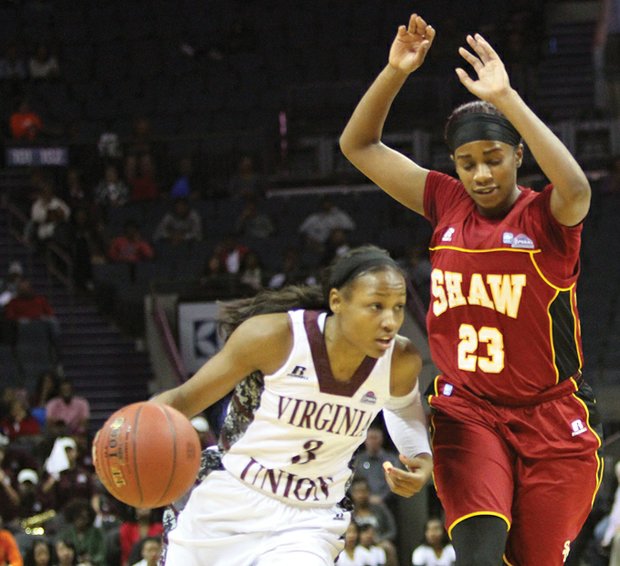 CIAA Tournament Most Valuable Player Kiana Johnson of Virginia Union University dribbles past a Shaw University player in the title game Saturday.
