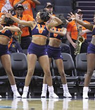 CIAA FUN // The well-known Virginia State University Woo Woos cheerleading squad, below, rocked the house, as always. 