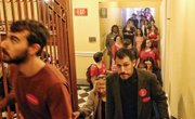 Members of the impromptu “Keep Ken Out” movement line the hallway and steps leading to the Virginia Senate gallery. Wearing stickers, like the one above, they came to the State Capitol to protest a Republican plan to seat Ken Cuccinelli on the Virginia Supreme Court. The protest and plan ended when he declined the position.