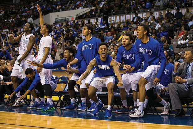 
The Hampton University men’s basketball team erupts in celebration Saturday night as the Pirates put the finishing touches on its 81-69 victory over South Carolina State University to win the MEAC Tournament at the Norfolk Scope.