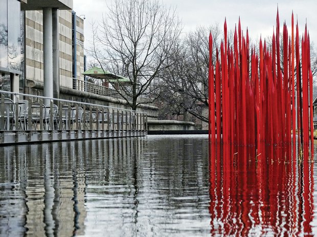 Dramatic glass reeds decorate the reflecting pool in The E. Clairborne and Lora Robins Sculpture Garden outside the Virginia Museum of Fine Arts. Dale Chihuly created the giant red reeds for a 2012 exhibit of his work at VMFA, and the museum acquired the work a year later. Internationally known in the field of glass artistry, Mr. Chihuly and his staff used red glass from Finland and created the reeds at a Norwegian glass factory that can handle such long pieces. Water lilies, lotuses and grasses have been planted throughout the installation to add a natural touch, according to the museum.