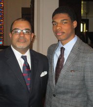 Richmond Circuit Court Chief Judge Clarence N. Jenkins Jr. stands with his son, Clarence N. Jenkins III, at Garland Avenue Baptist Church following Sunday’s Men’s Day service.