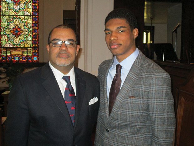 Richmond Circuit Court Chief Judge Clarence N. Jenkins Jr. stands with his son, Clarence N. Jenkins III, at Garland Avenue Baptist Church following Sunday’s Men’s Day service.