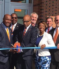 Official opening at VSU // Virginia State University officials and special guests help to cut the ribbon on the new $84 million VSU Multipurpose Center on campus that will host university and community events. The official ribbon cutting coincided with the university’s 134th Founders’ Day convocation, with retired Brig. Gen. Sheila Baxter, a 1977 VSU alumna, giving the keynote address. The event also observed the 100th anniversary of the Reserve Officers’ Training Corps, or ROTC. Brig. Gen. Baxter, who initially was commissioned in 1978 through the ROTC, was the first African-American female to be promoted to brigadier general in the Army Medical Service Corps in 2003. Participating in the ribbon cutting are, from left, VSU Vice Rector Willie Randall, VSU President Makola Abdullah, Delegate Lashrecse Aird, Chesterfield Board of Supervisors Chairman Steve Elswick and Chesterfield’s Dale District Supervisor James Holland.