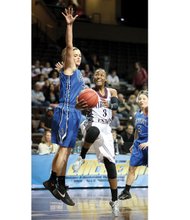 Virginia Union University star Kiana Johnson drives to the basket against Bentley University’s Jen Gemma during Tuesday’s heart-wrenching 53-52 loss by the Lady Panthers in the NCAA Women’s Division II Elite Eight in Sioux Falls, S.D.